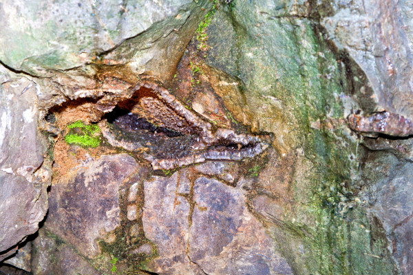 Image of a Gemstone in Mother Rock inside a mine